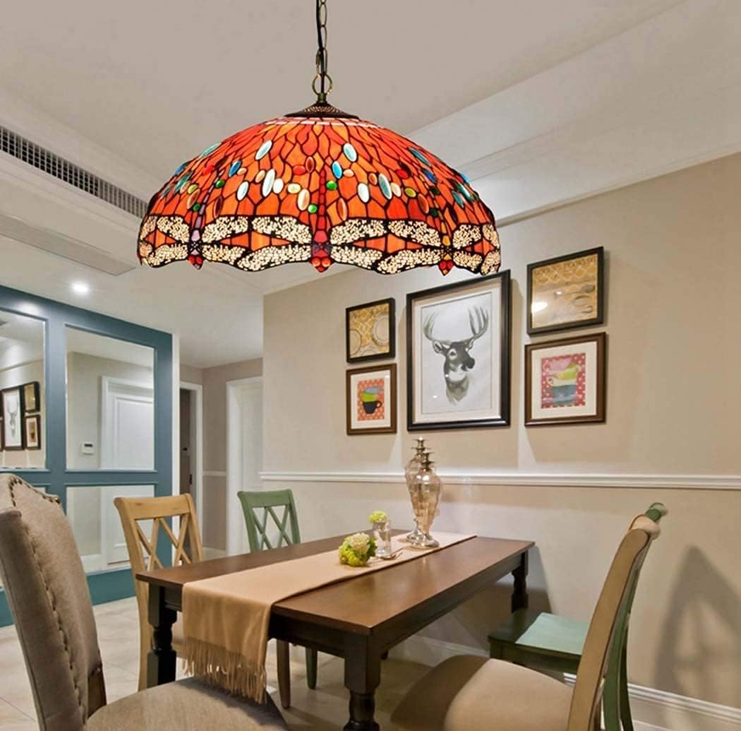 Pavo Monitor Arm installed on a wooden desk with monitor adjusted to eye level